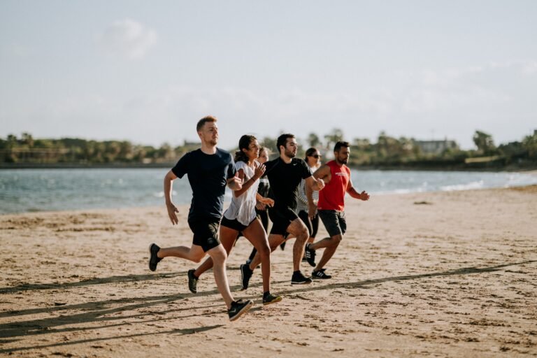 group of runners at the beach